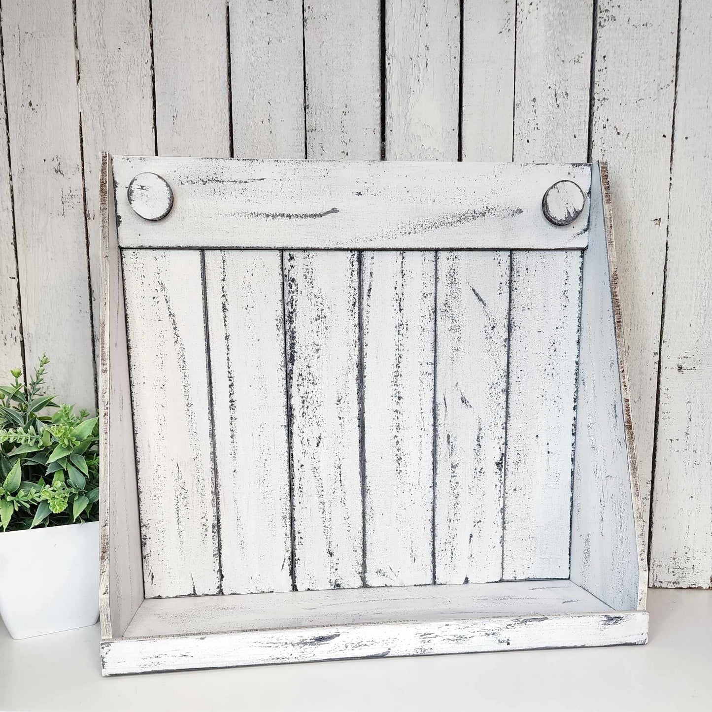 This charming farmhouse display is perfect for showing off your crafts and creations. DIY Assemble is required. We provide the glue and the display, you provide the flair.